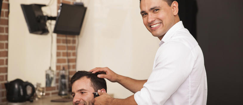 Barber cutting hair