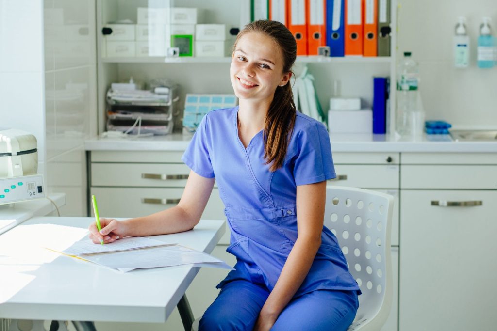 Medical assistant in training working in lab