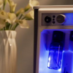 A close-up shot of the DiamondGlow clinical dermabrasion device being prepared for a skincare treatment.